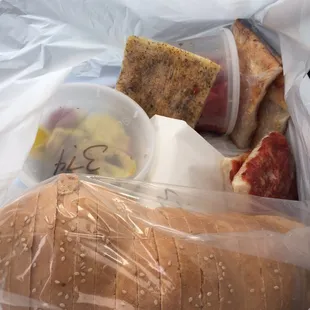 A haul of great food! Bread (that might make you cry it's so good), Fontina, roasted red peppers, olives....