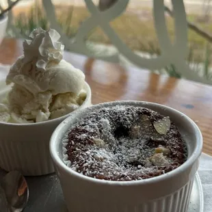 two bowls of dessert on a table