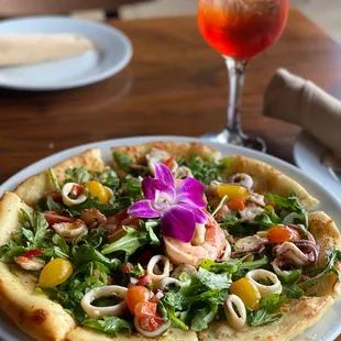 a plate of food and a drink