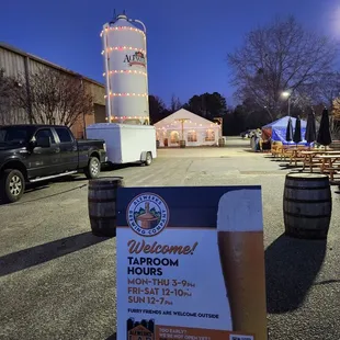 a sign for the taproom hours