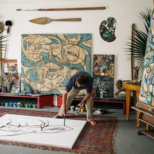 Alex Beard working in his painting studio. Photo by Bryan Tarnowski, Spring 2017.