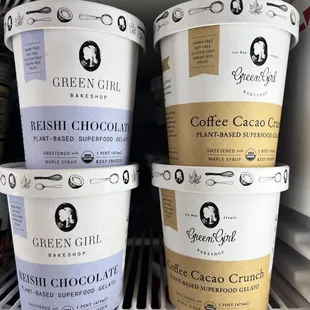 three ice creams in a refrigerator