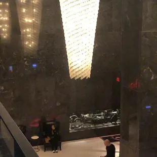 a man standing in a lobby