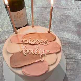 Almond 6 in round cake with strawberry filling and cream cheese icing.