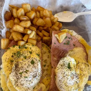 Eggs Benedict, hash instead of grits .. I added my own pepper