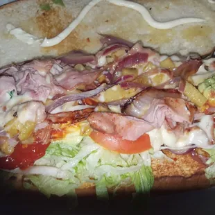 Torta Hawaiiana Pineapple, ham,grilled onions on melted cheese.