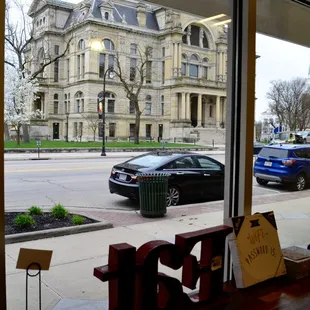 a view of a street through a window