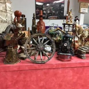 Random antique figures on a shelf