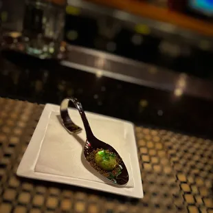 Surprised serving of an amuse-bouche of "greens"