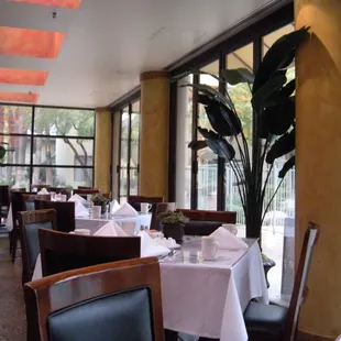 tables with white tablecloths and white tablecloths