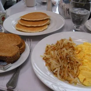 Eggs &amp; Hashbrowns entree ($8.75 prior to tax) &amp; a short stack order of pancakes (comes with 3 pancakes, $7.75 prior to tax)