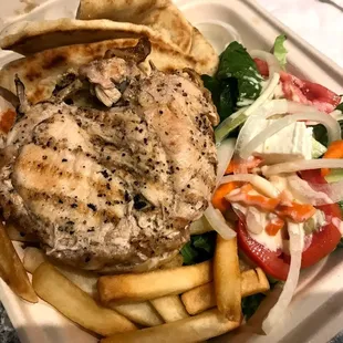 Greek chicken dinner with Greek salad, fries, pita and rice | $8.99