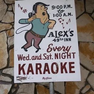 a sign for karaoke