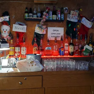 a bar with bottles of alcohol