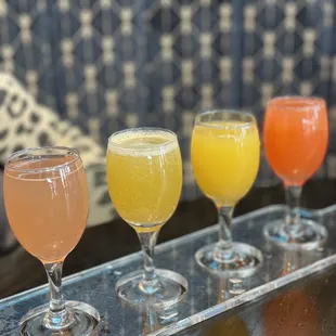 a row of glasses of beer