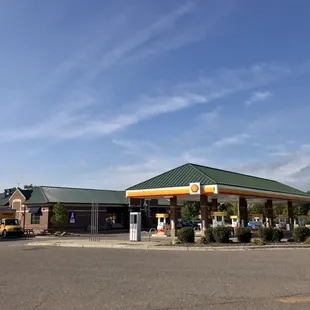 Main view of main canopy and convenience store, facing west-southwest