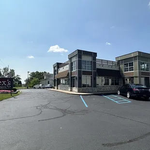 a car parked in front of a building