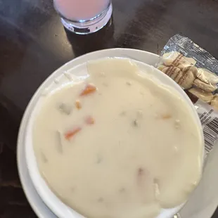 a bowl of soup and crackers
