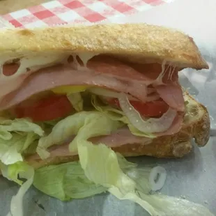 Alex's pizzeria.  Had the Italian Sub.  Photo is of a half sandwich! Underpticed at $7.99.  Enough for 3-4 people.  Great service