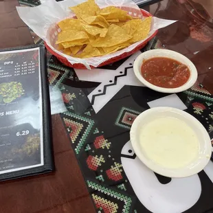 Complimentary Warm corn chips, salsa and warm cheese dip