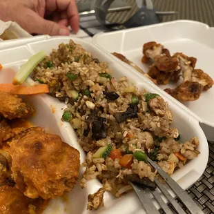Buffalo wings and French fries (notice that it's rice and it's nasty)