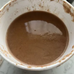 Side of refried beans.   Super watery do not recommend!!