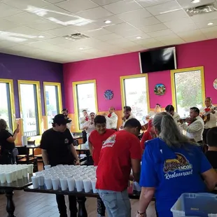 a large group of people in a restaurant