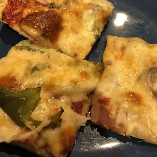 Green pepper, mushroom, onion pizza