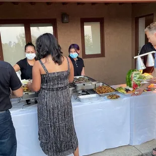 Professional staff serving delicious food!