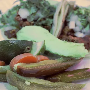 Our Asada Tacos, always served with jalapeños, carrots, and lemon for a great touch on the side.