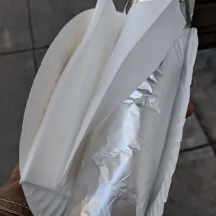 Review said burritos are not that big. Judge for yourself (paper plate for scale)