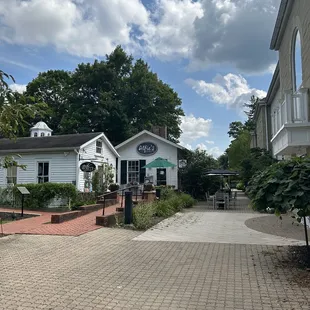 Front of Alfie&apos;s, from E Broadway, left of the library
