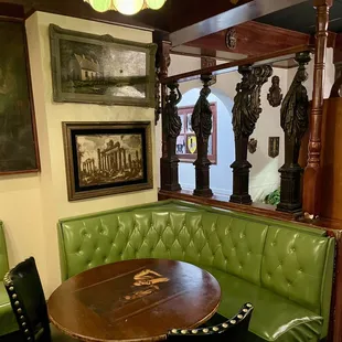 a booth with a table and chairs