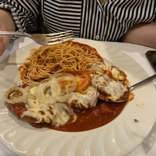 a plate of spaghetti and meat
