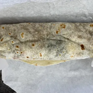 a burrito wrapped in paper