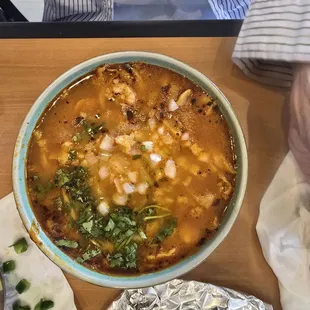 Small menudo with "lots of hominy"