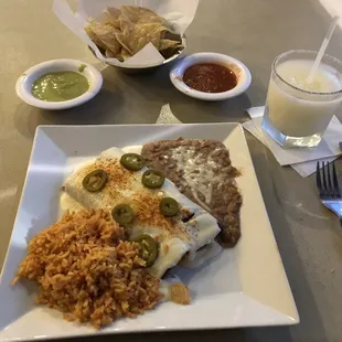 Sour Cream Chicken Enchiladas never disappoint at this cozy &amp; welcoming family owned resturant in my neighborhood!