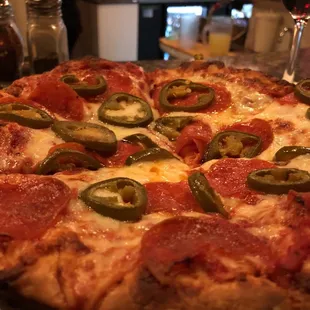 10" Pepperoni Pizza with Jalapeños (crust well done)! Pizza is bomb!!! Especially when you pair it with a wonderful lager or house merlot.