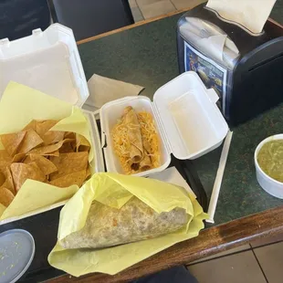 Carne Asada Burrito Chips and Guacamole 3 Rolled Tacos with Cheese