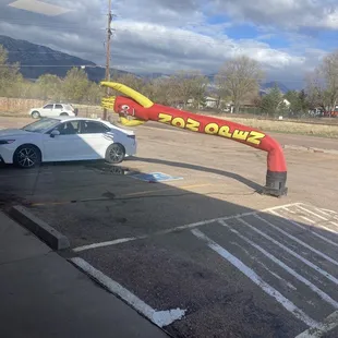 Wavy arm guy drew me in,  Parked in his shadow getting chorizo breakfast burrito