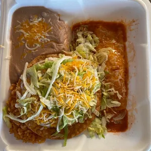 Cheese enchiladas, refried beans guacamole tostado
