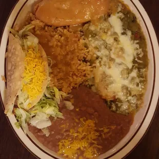 Cheese enchilada with green sauce, shredded beef taco and chile rellano.....all yummy.