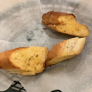 two pieces of bread in a basket