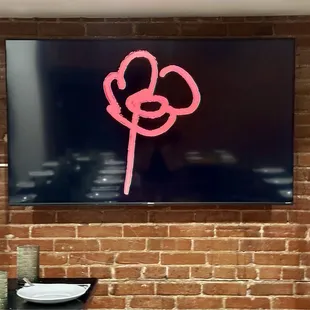 The poppy is the restaurant&apos;s design theme.