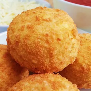 a pile of fried cheese balls