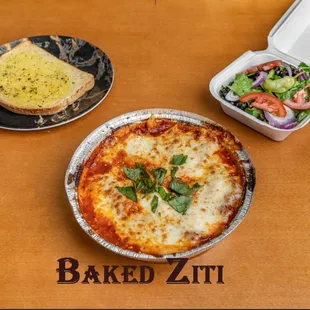 Baked Ziti.
Ziti with mozzarella and Ricotta Cheese tomato sauce baked to perfection in our oven.