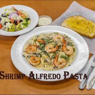 Fettuccine Alfredo with Shrimp.
Shrimp, mushrooms, garlic, fresh basil, alfredo