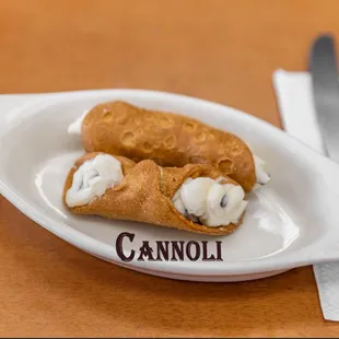 Cannoli.
Delicious tube of fried dough, filled with a sweet, creamy ricotta filling.