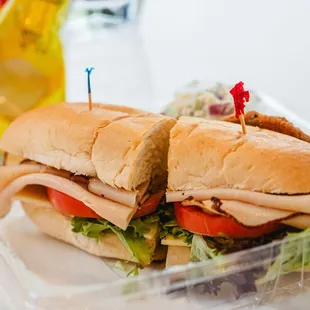 Boxed lunches- sandwich, chips, water, potato salad, cookie