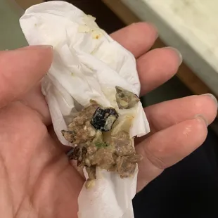 Spit out the food to see what was so hard and it&apos;s some sort of black plastic, there was several pieces in the burrito